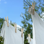Sheets hanging on a clothesline outside