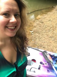 girl smiling in canoe
